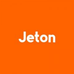 Biały napis Jeton na pomarańczowym tle